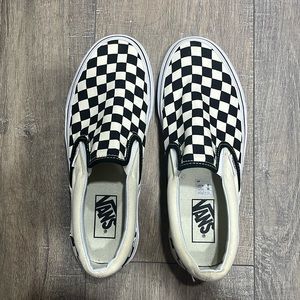 Hi! I am selling a pair of checkered Vans shoes. Come check them out!